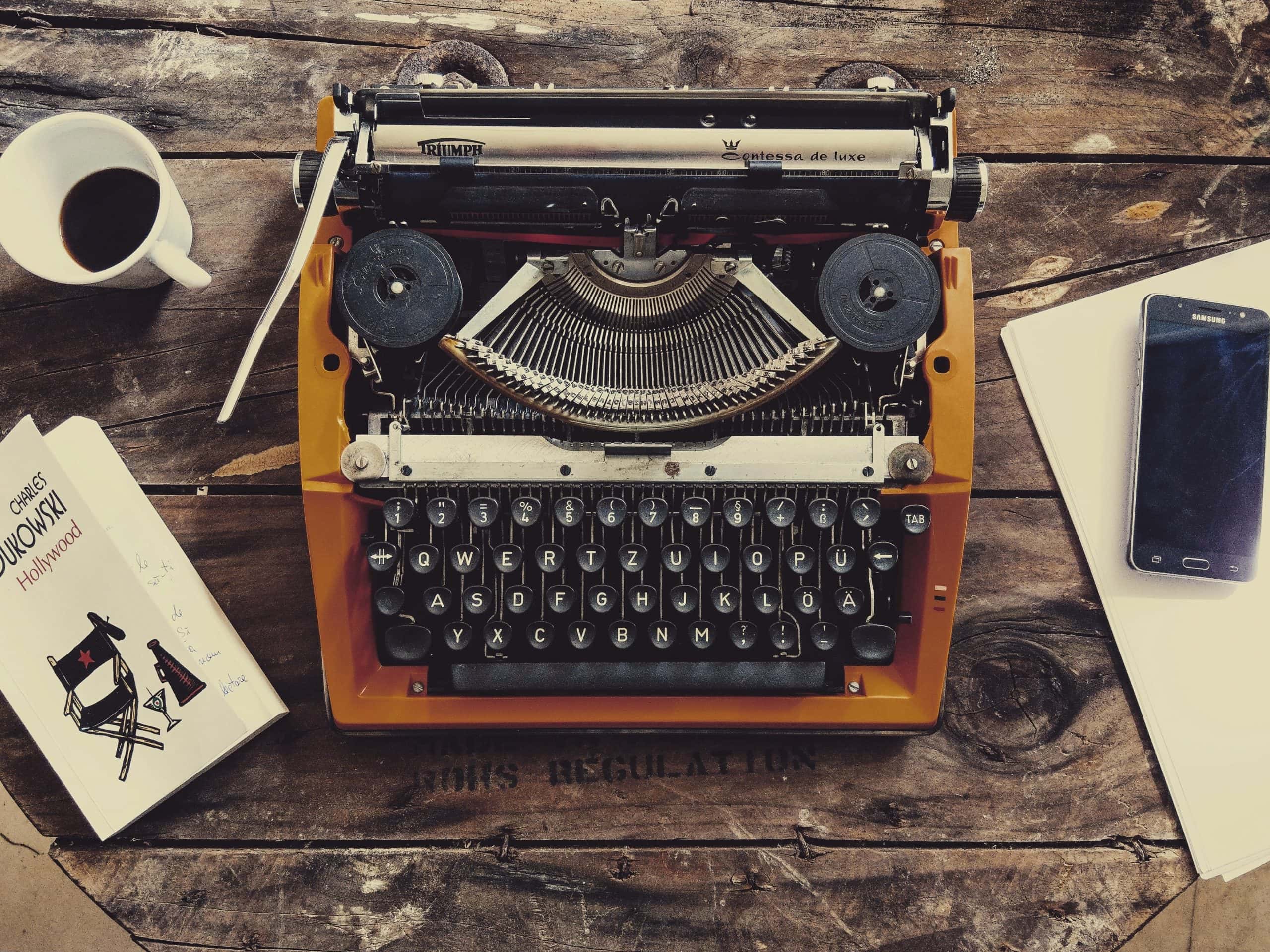 The Best Filmmaking Blogs in 2021 - An image of a typewriter and coffee