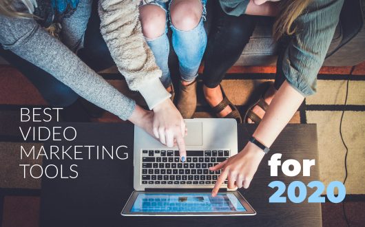 best video marketing tools 2020 - girls pointing at laptop