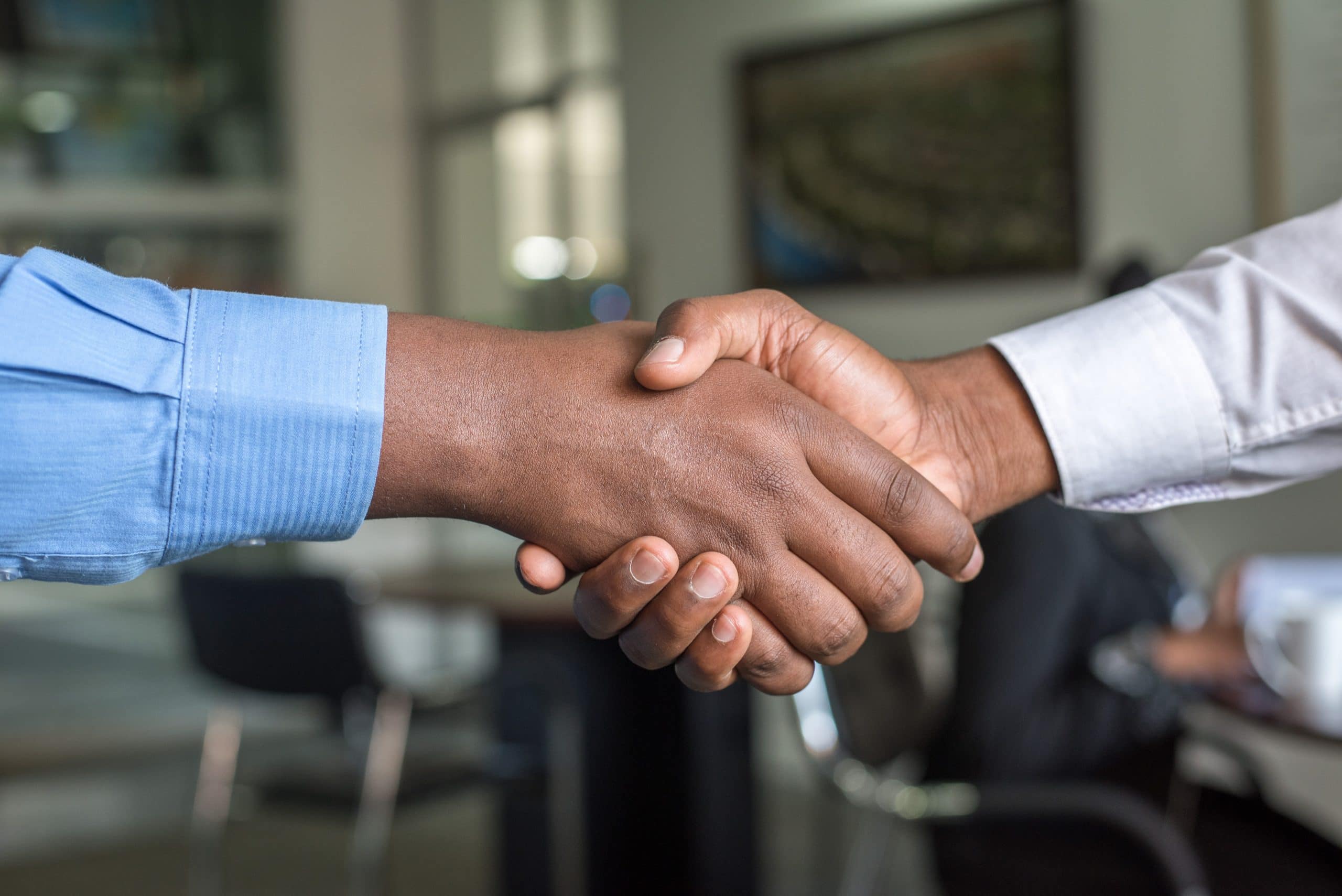 How to prepare a professional video resume - An image of two people shaking hands